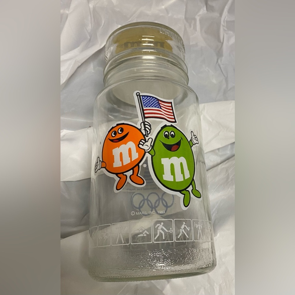 1984 M&M, Olympic Commemorative Jar.  8”tall